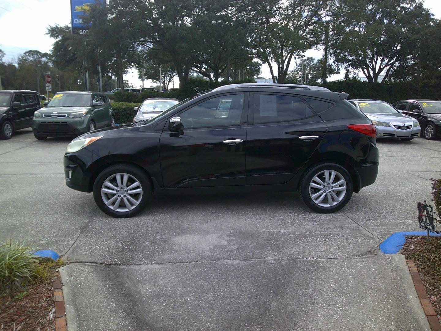 2011 BLACK HYUNDAI TUCSON GLS; LIMITED (KM8JU3AC0BU) , located at 390 Hansen Avenue, Orange Park, FL, 32065, (904) 276-7933, 30.130497, -81.787529 - Photo#1